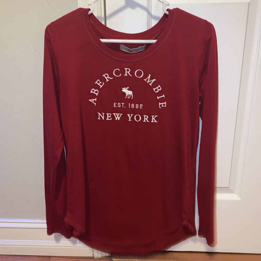 A long-sleeve red shirt.